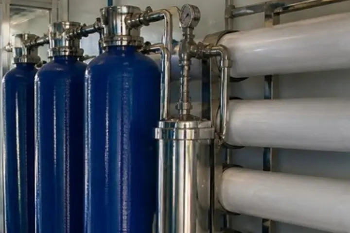 Stainless steel housing with a pressure gauge on a water line